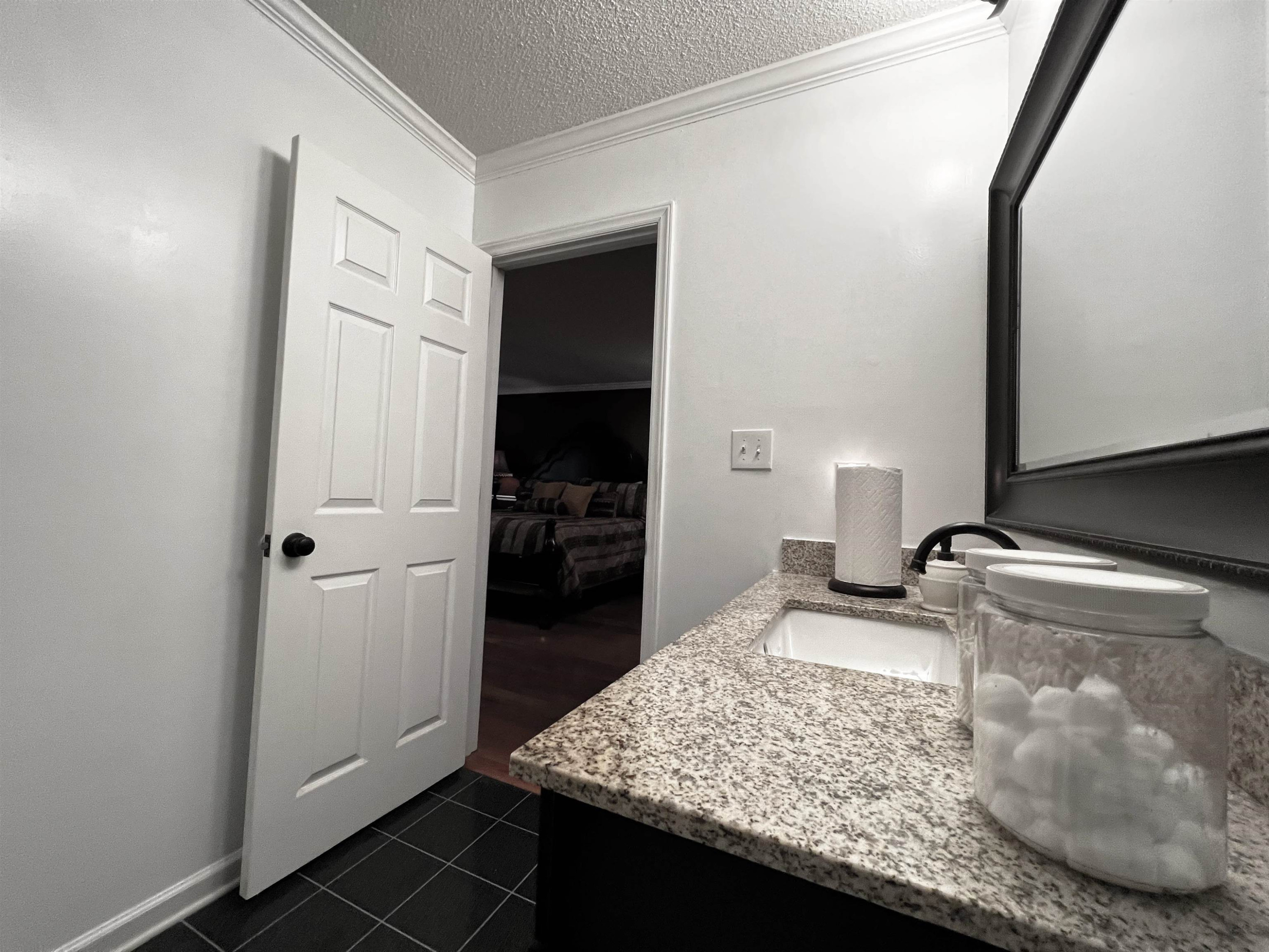424 Eugene Street Durham, NC 27701 - Photo 17 of 26 a kitchen with a sink stove and refrigerator