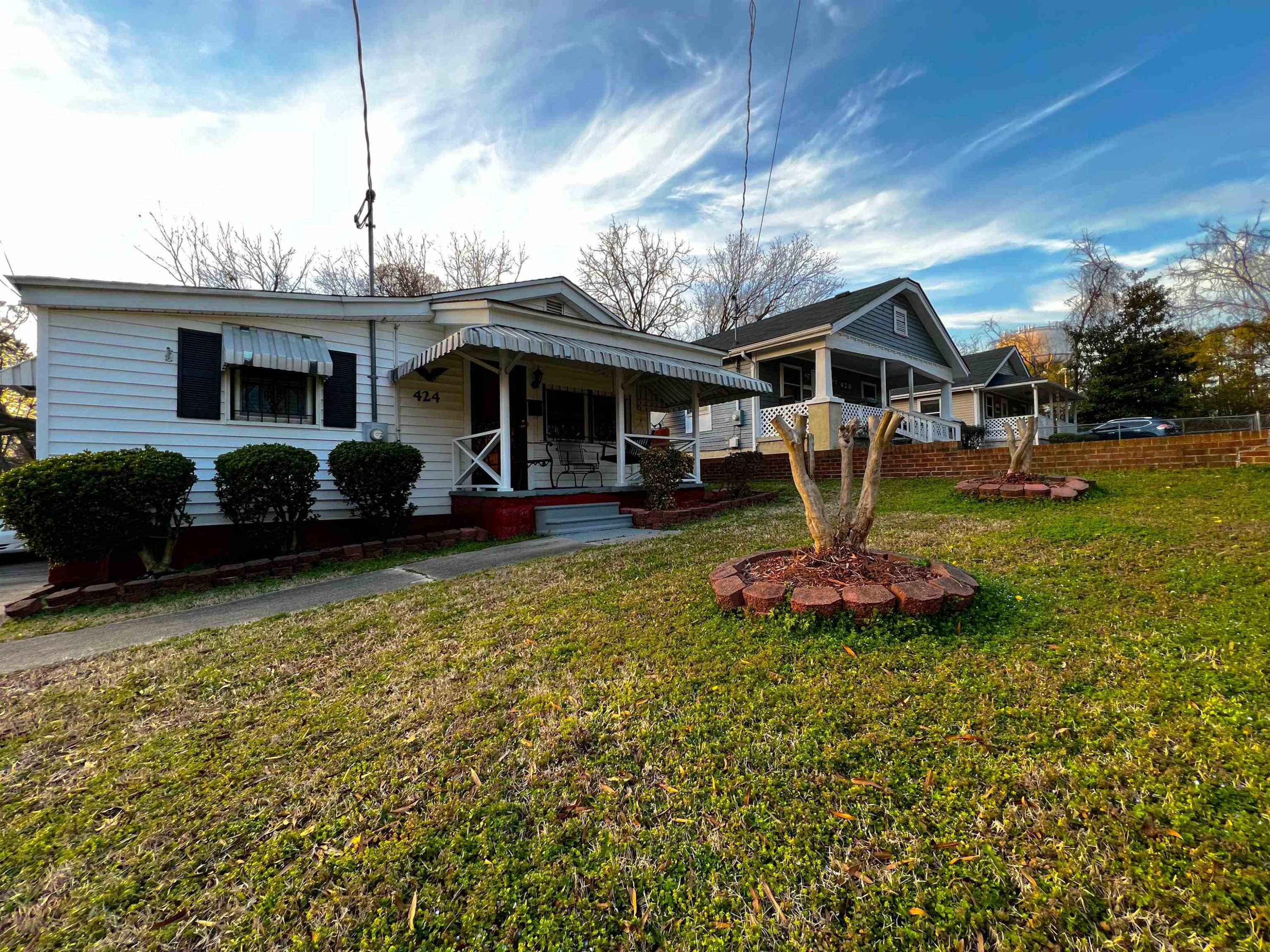 424 Eugene Street Durham, NC 27701 - Photo 2 of 26 a front view of a house with garden
