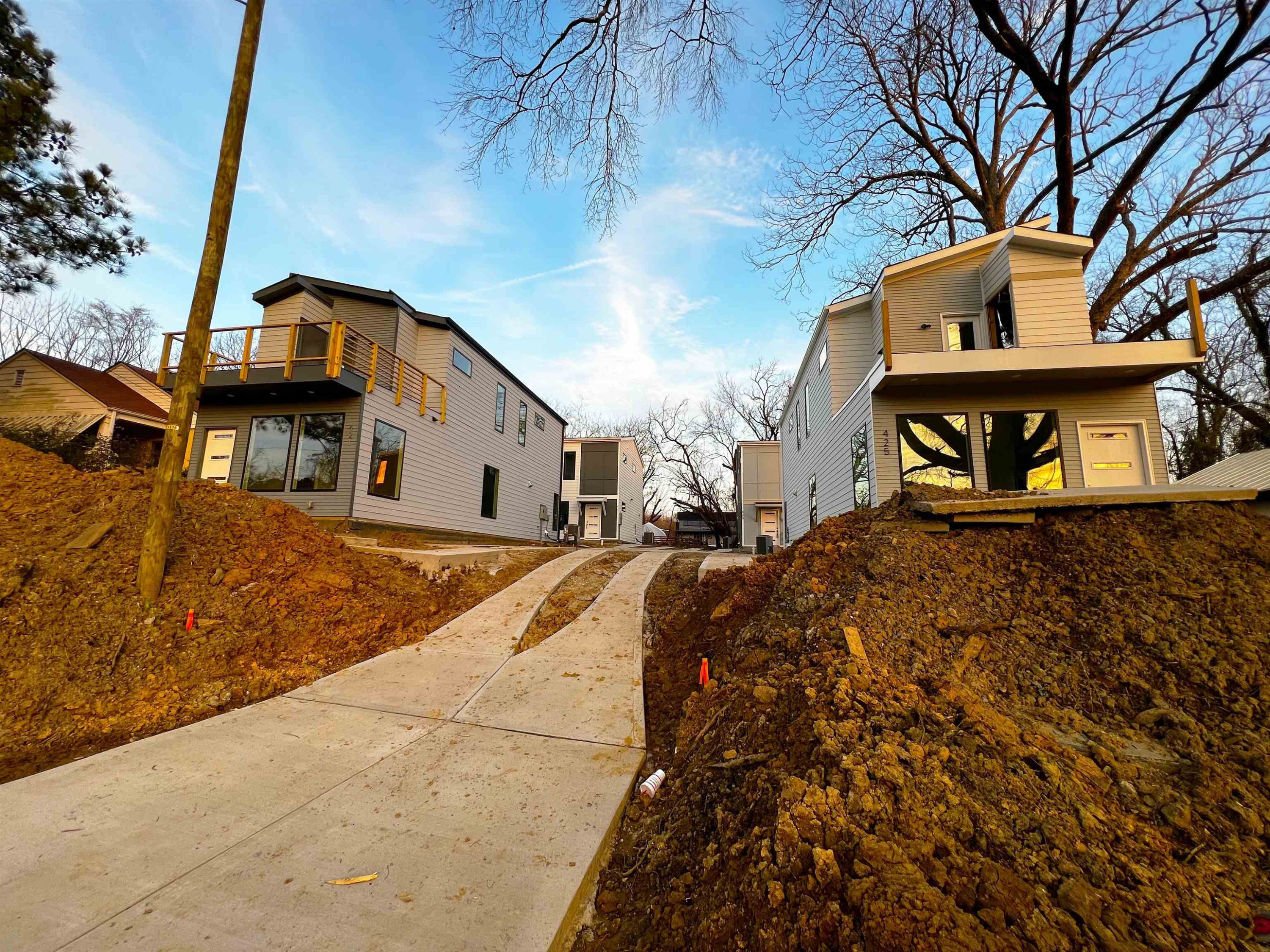 424 Eugene Street Durham, NC 27701 - Photo 21 of 26 a front view of a house with large trees
