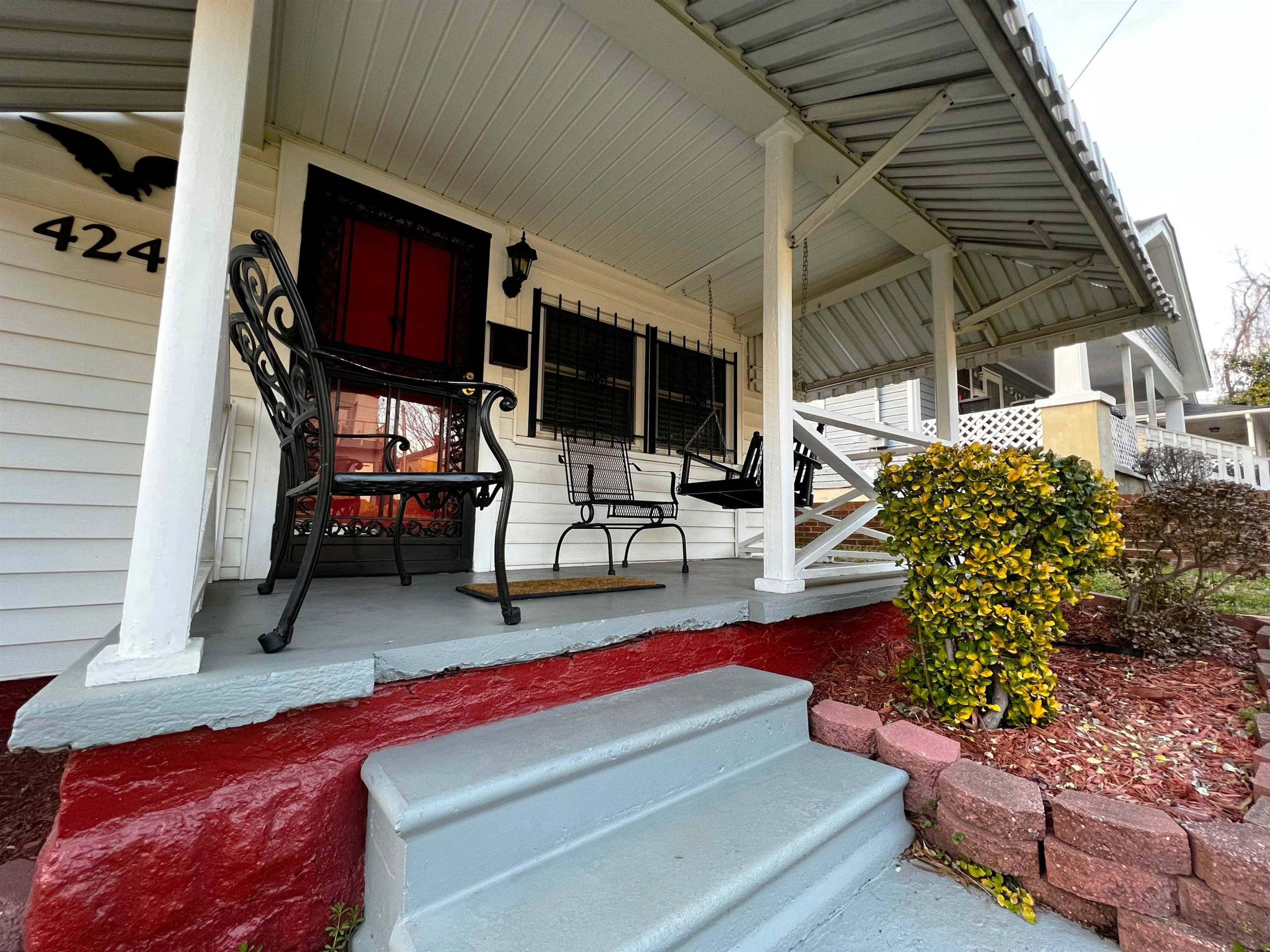 424 Eugene Street Durham, NC 27701 - Photo 5 of 26 a backyard of a house with seating space