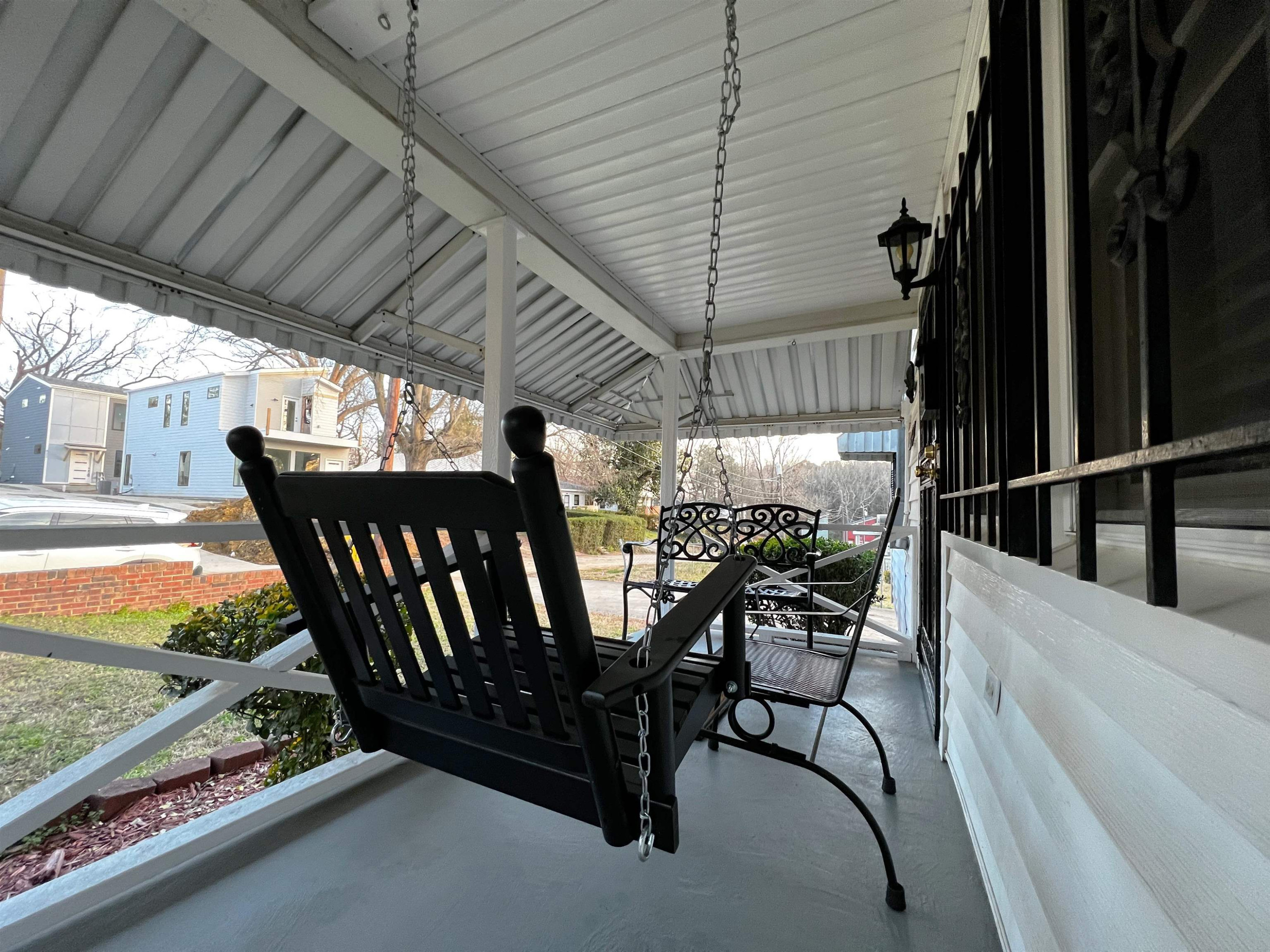 424 Eugene Street Durham, NC 27701 - Photo 7 of 26 a view of a chairs and table in the balcony