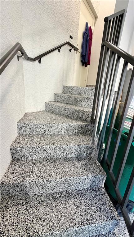 15536 Monterosso Lane, Unit 201 Naples, FL 34110 - Photo 23 of 29 a view of a staircase