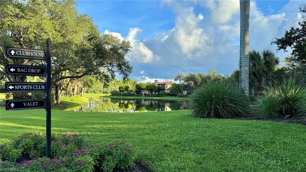 15536 Monterosso Lane, Unit 201 Naples, FL 34110 - Photo 28 of 29 a view of lake with green space
