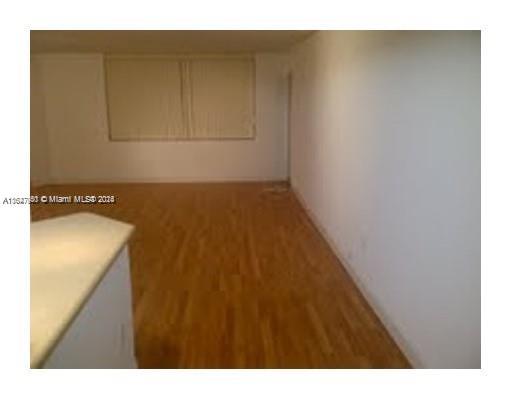 2750 Northeast 183rd Street, Unit 707 Aventura, FL 33160 - Photo 6 of 8 a view of a closet area