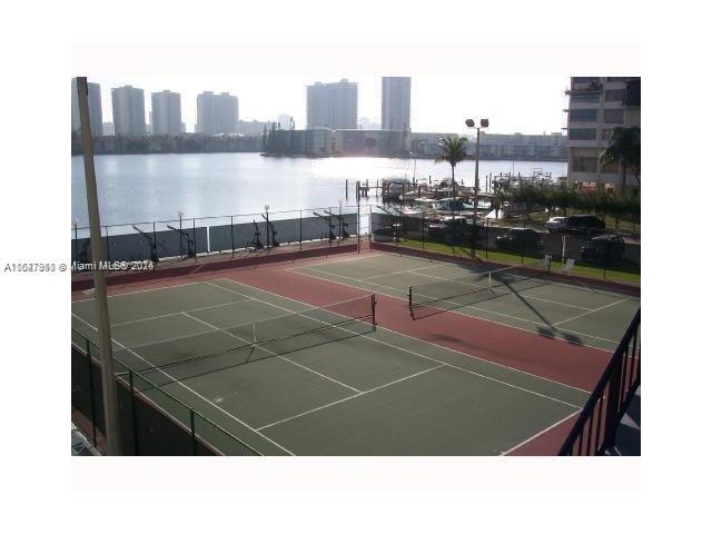 2750 Northeast 183rd Street, Unit 707 Aventura, FL 33160 - Photo 7 of 8 a tennis court view