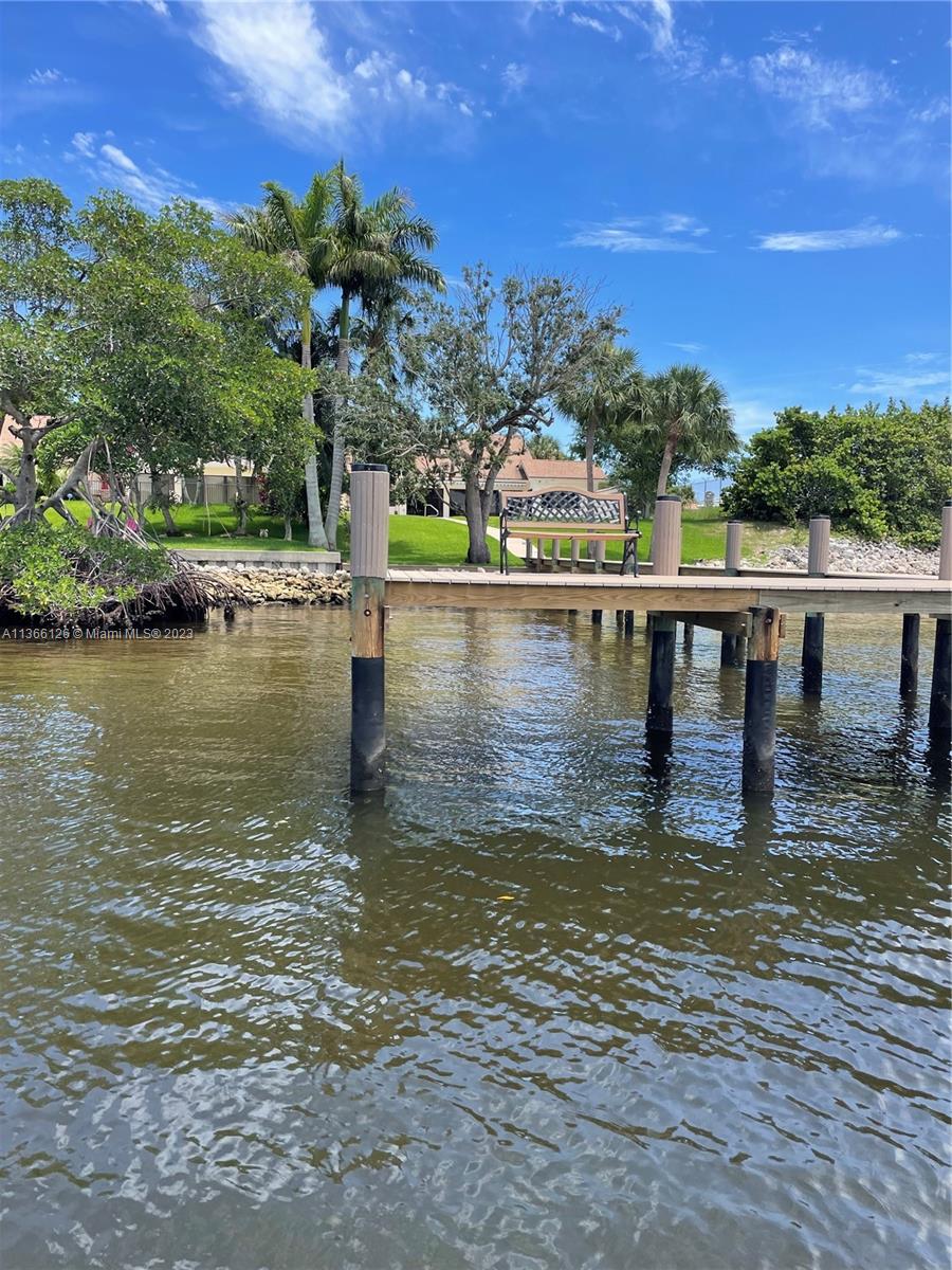 150 Harbourside Circle Jupiter, FL 33477 - Photo 47 of 61 a view of a lake with a mountain
