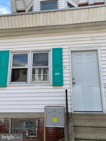 a view of a building with car windows