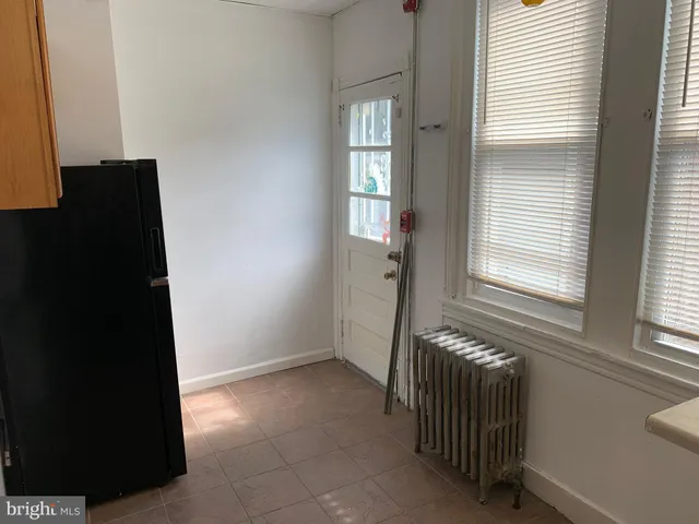 a view of empty room with windows