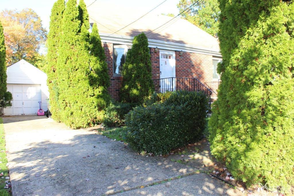 8 Maple Road Iselin, NJ 08830 - Photo 20 of 21 a view of a back yard of the house