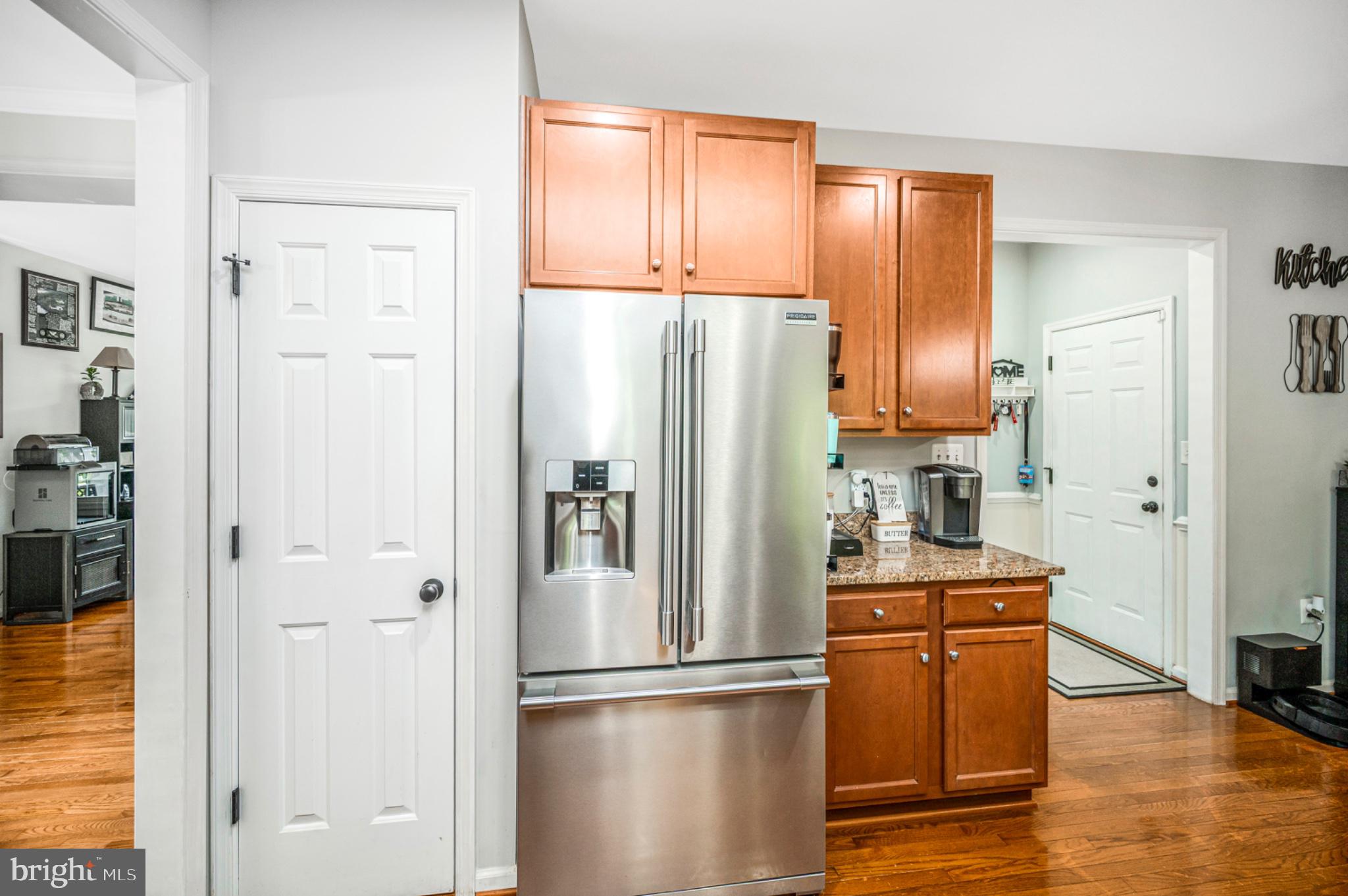 239 Toluca Road Stafford, VA 22556 - Photo 44 of 75 Modern kitchen with warm wood accents.