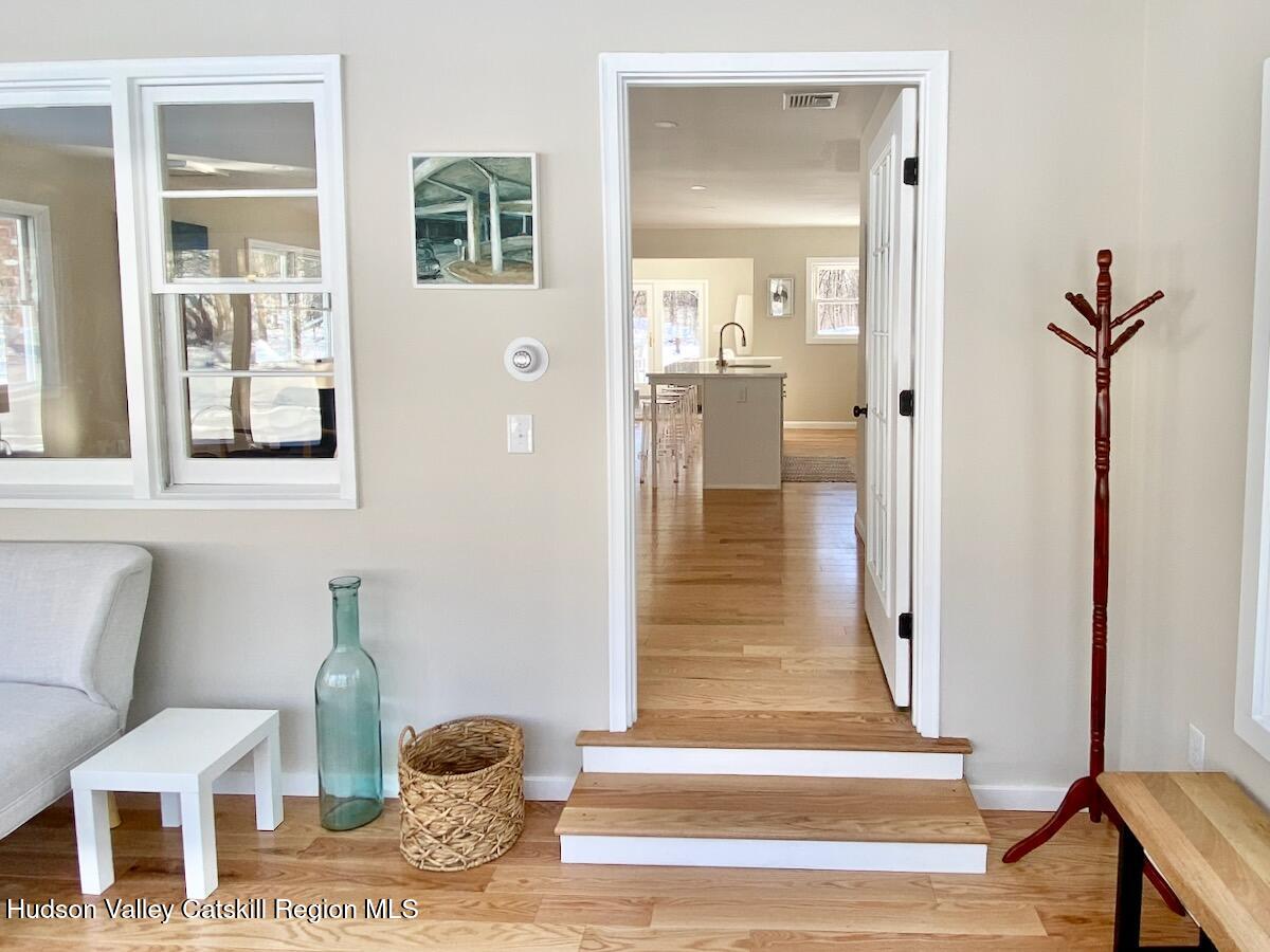 132 Weeds Mill Road Highland, NY 12528 - Photo 19 of 37 a view of a hallway with a livingroom and furniture