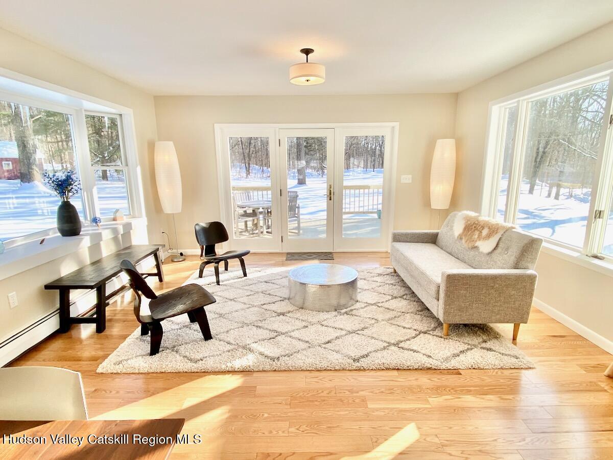 132 Weeds Mill Road Highland, NY 12528 - Photo 2 of 37 a living room with furniture and a large window