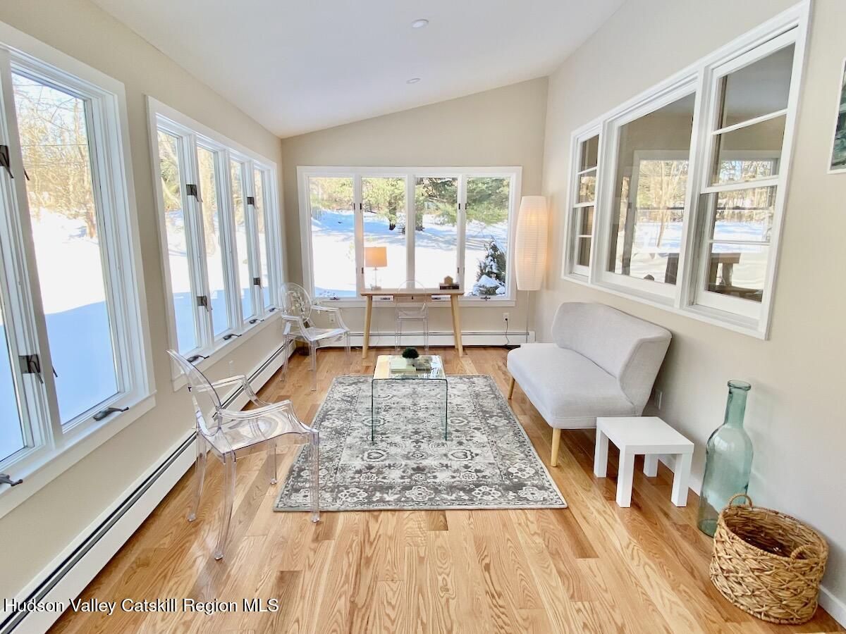 132 Weeds Mill Road Highland, NY 12528 - Photo 21 of 37 a living room with a couch and large windows