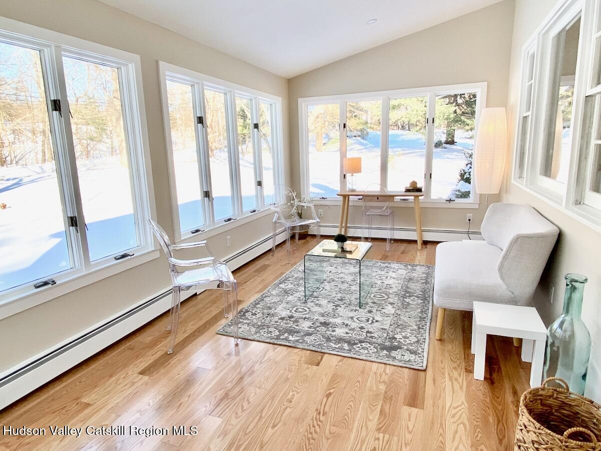 132 Weeds Mill Road Highland, NY 12528 - Photo 22 of 37 a living room with a couch and large windows