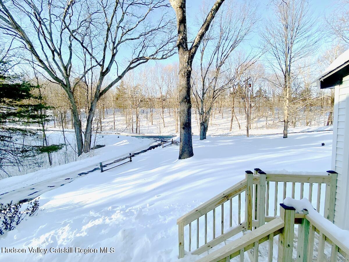 132 Weeds Mill Road Highland, NY 12528 - Photo 34 of 37 a view of a yard with trees and wooden fence