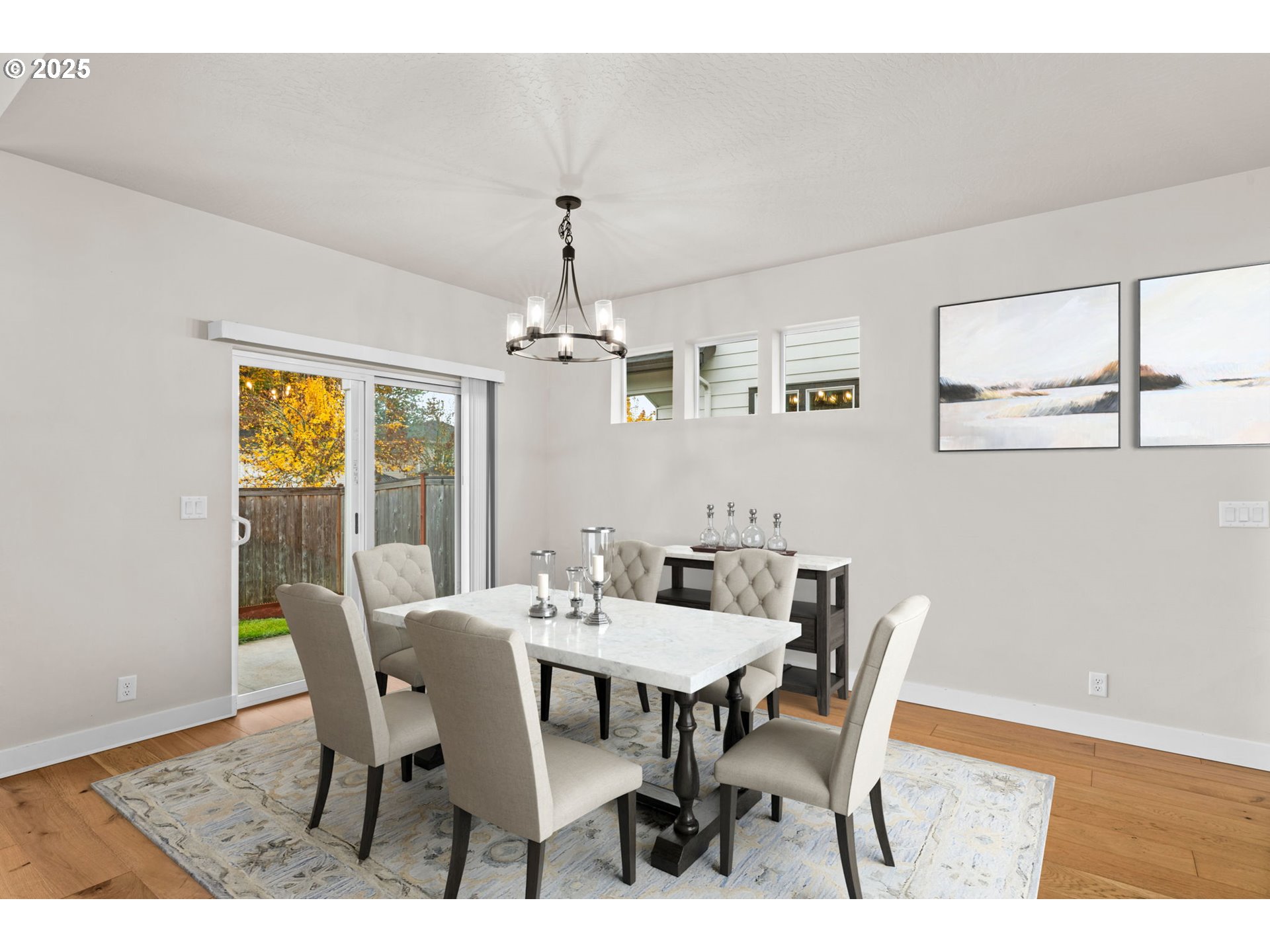 1030 53rd Place Springfield, OR 97478 - Photo 13 of 39 a view of a dining room with furniture window and wooden floor