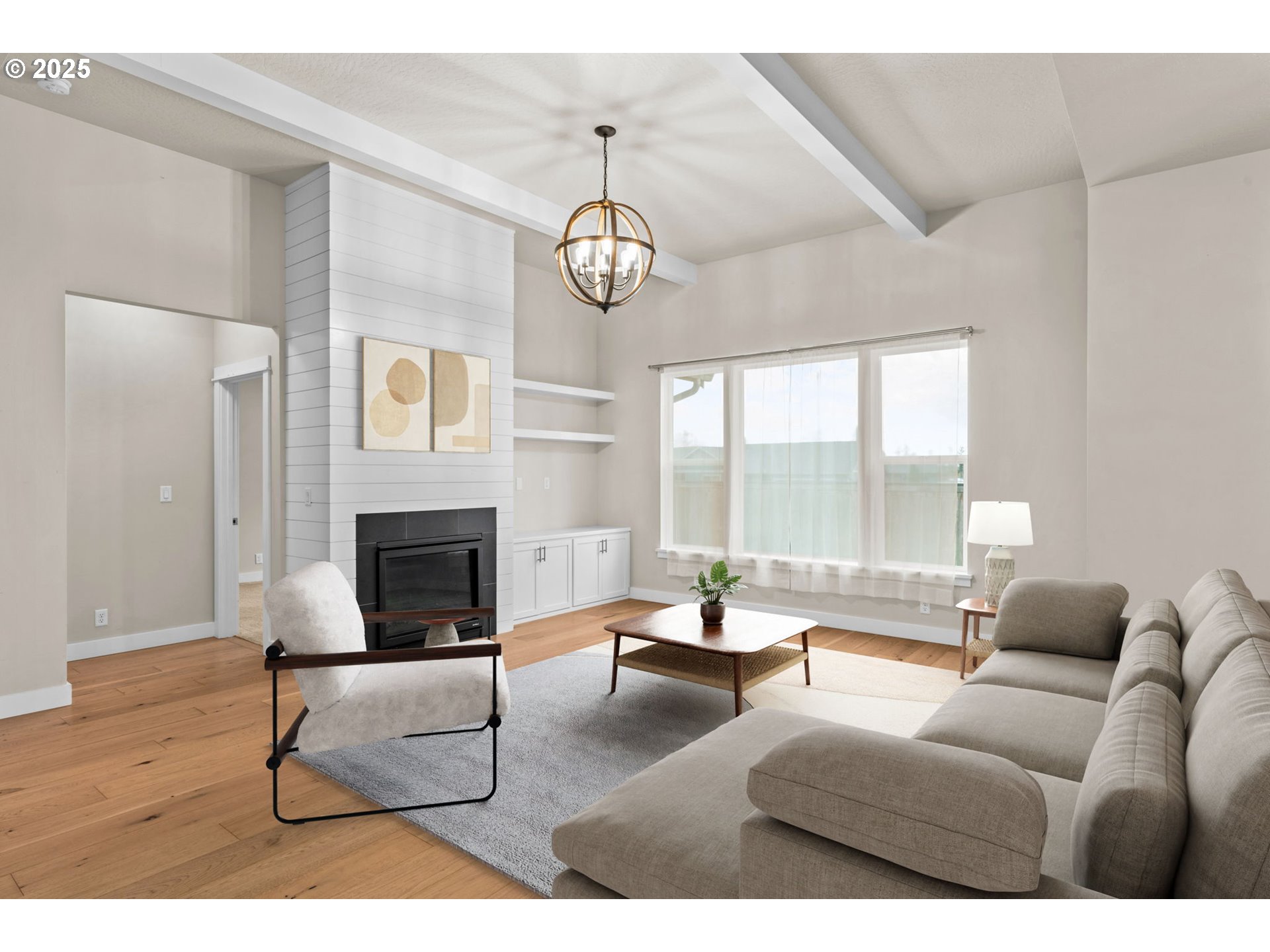 1030 53rd Place Springfield, OR 97478 - Photo 15 of 39 a living room with furniture a fireplace and a large window