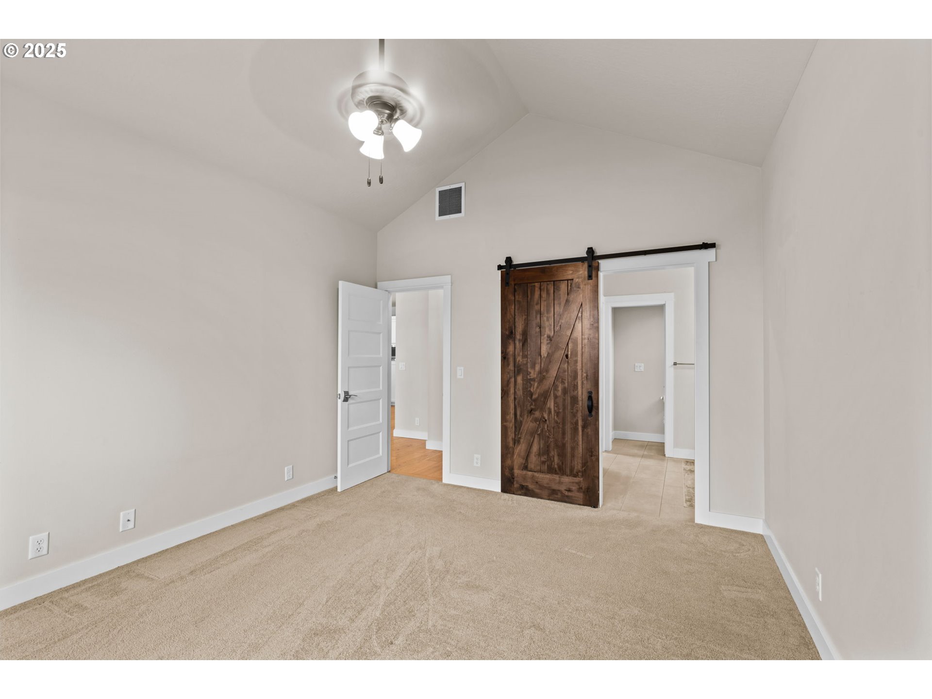 1030 53rd Place Springfield, OR 97478 - Photo 23 of 39 a view of a chandelier fan and entryway
