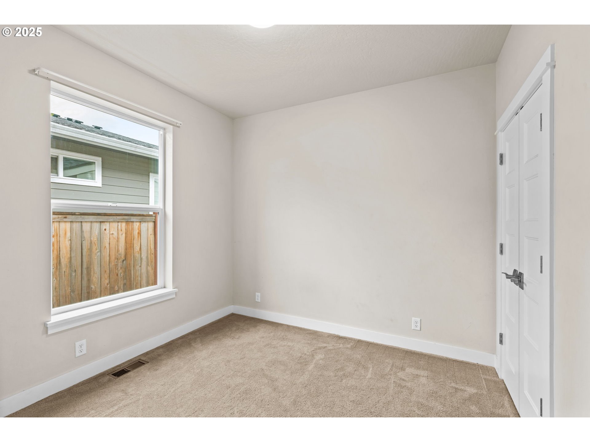 1030 53rd Place Springfield, OR 97478 - Photo 32 of 39 a view of an empty room with a window