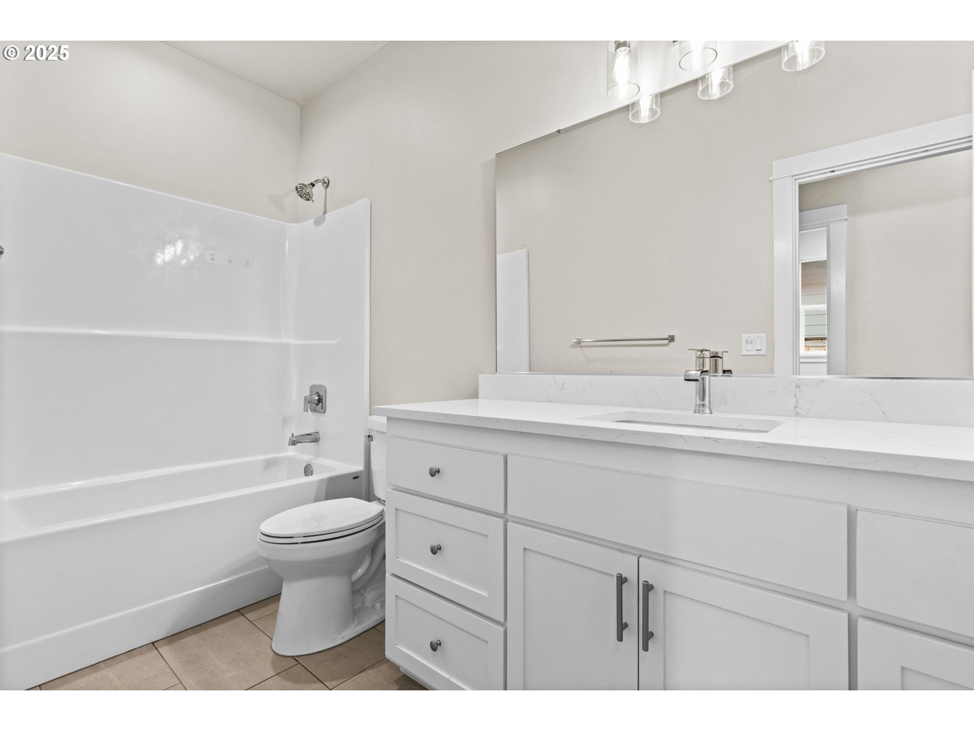 1030 53rd Place Springfield, OR 97478 - Photo 34 of 39 a bathroom with a sink a toilet and bathtub