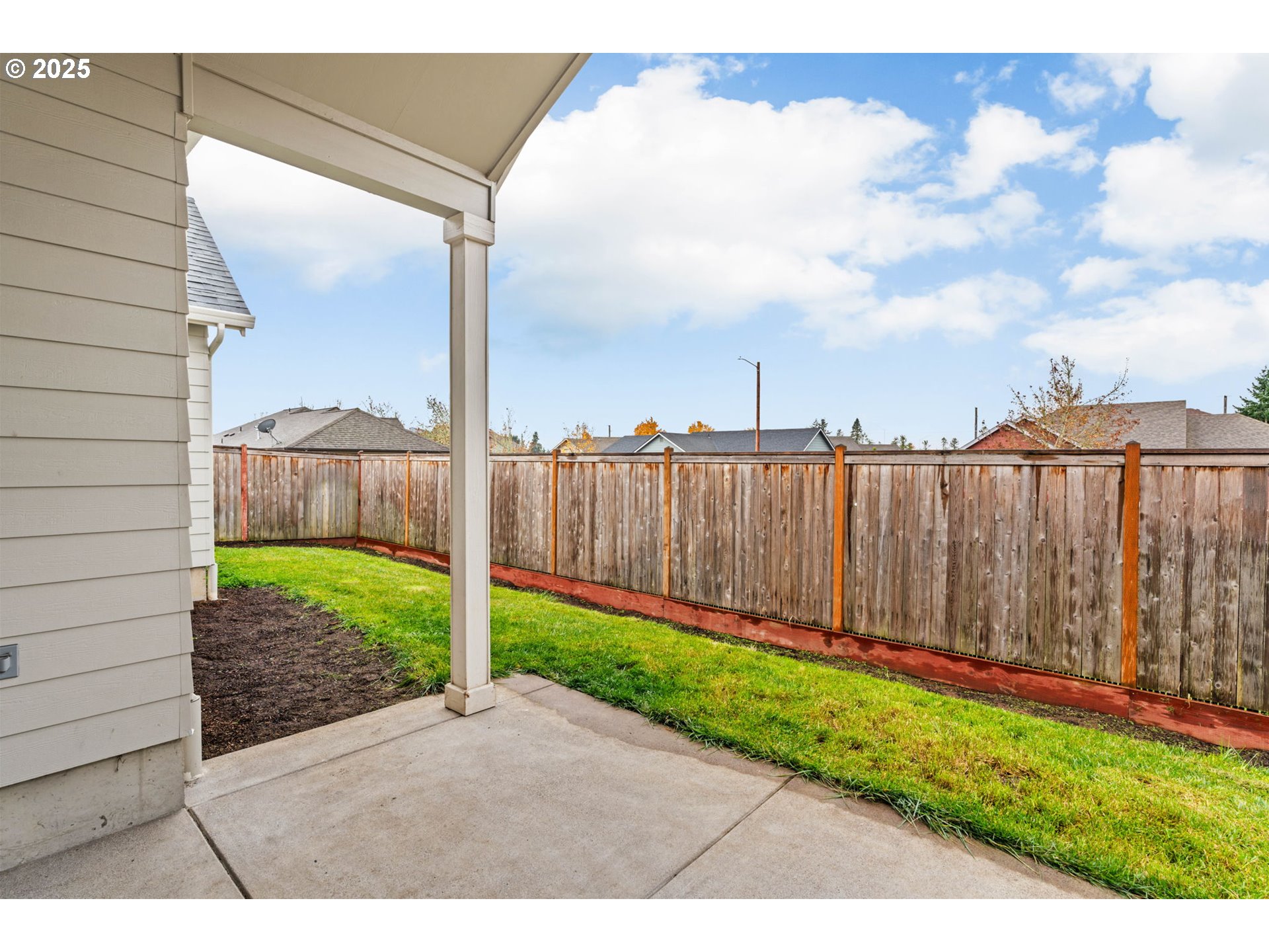 1030 53rd Place Springfield, OR 97478 - Photo 36 of 39 a view of a backyard with wooden fence
