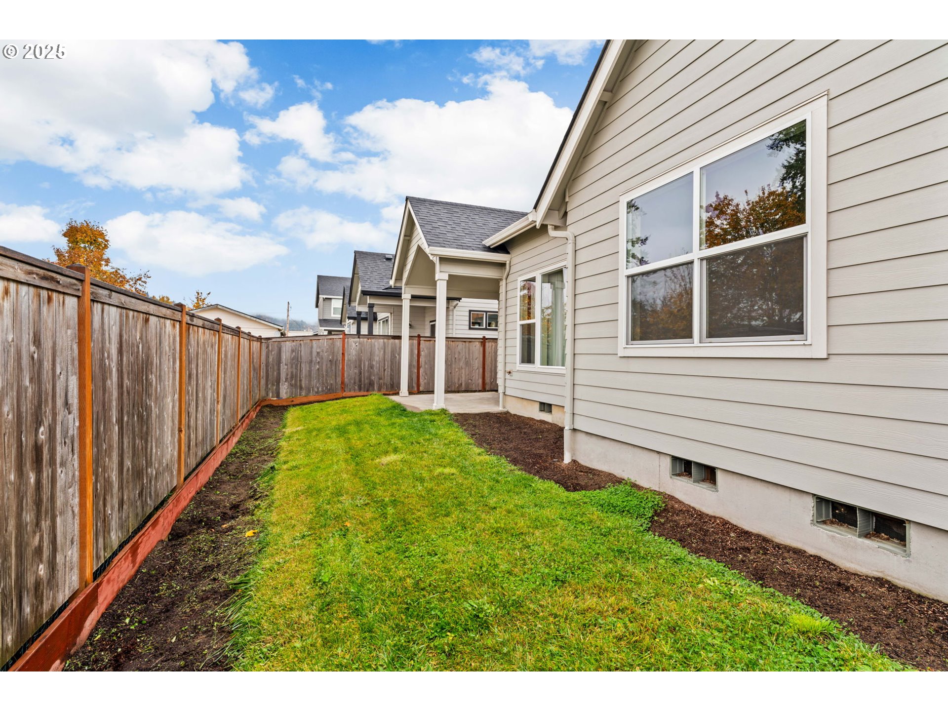 1030 53rd Place Springfield, OR 97478 - Photo 39 of 39 a view of a backyard with a garden