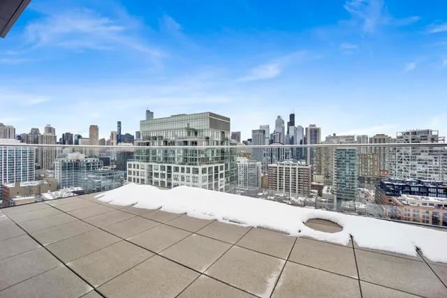 a view of a terrace with city view