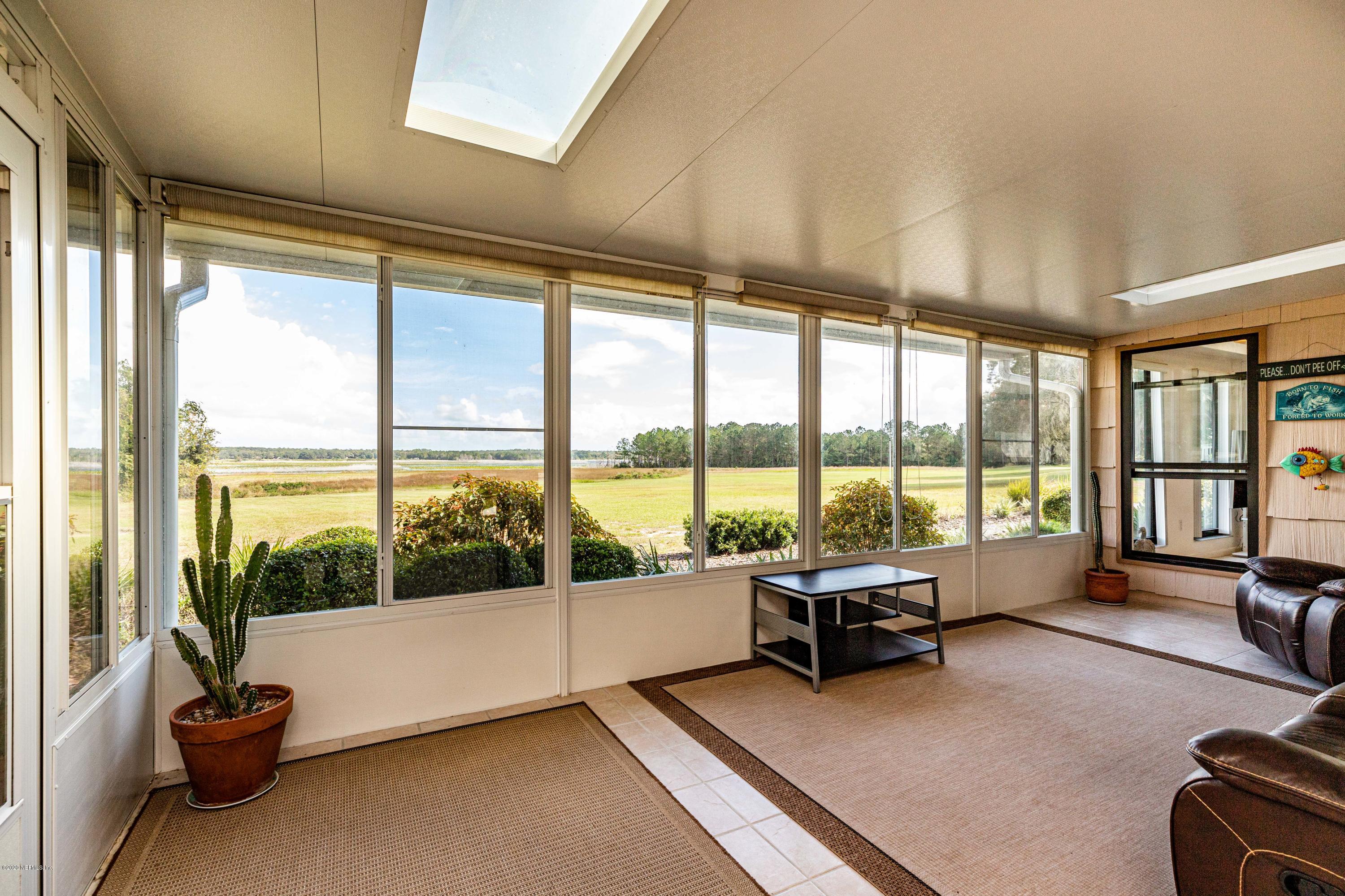 34 Nelsons Point Keystone Heights, FL 32656 - Photo 11 of 47 11 Sunroom View 2