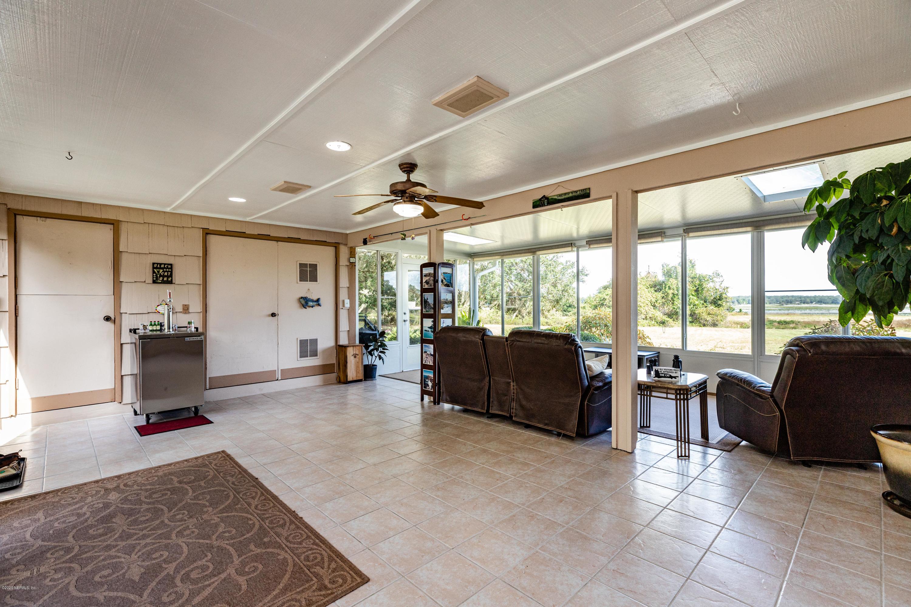 34 Nelsons Point Keystone Heights, FL 32656 - Photo 10 of 47 10 Sunroom