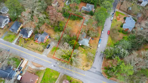 a view of swimming pool with a yard