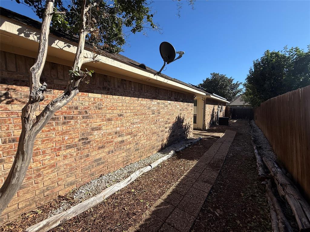 3515 Hilltop Lane Plano, TX 75023 - Photo 19 of 19 a view of a backyard of the house