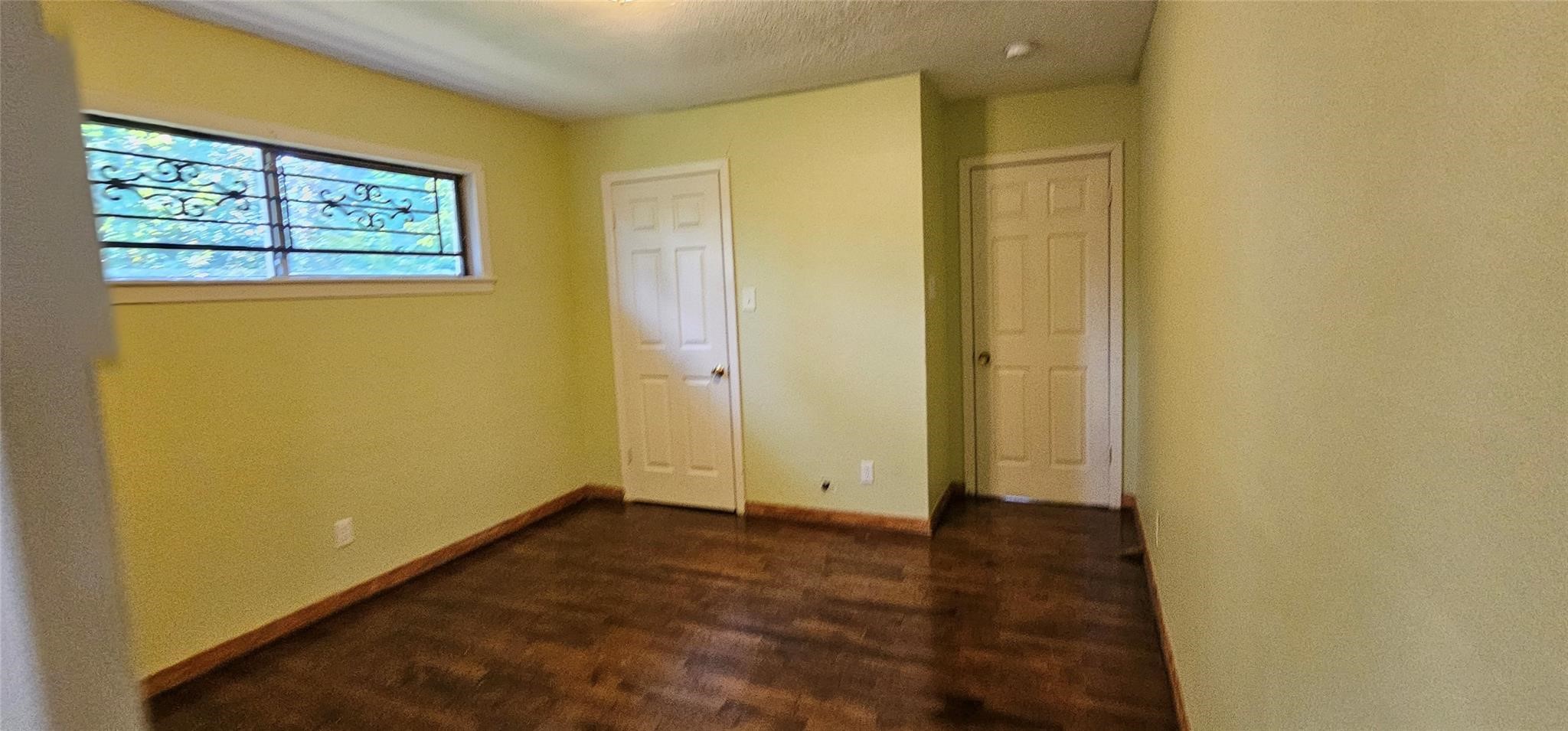 3610 Dennis Street Houston, TX 77004 - Photo 11 of 16 an empty room with windows