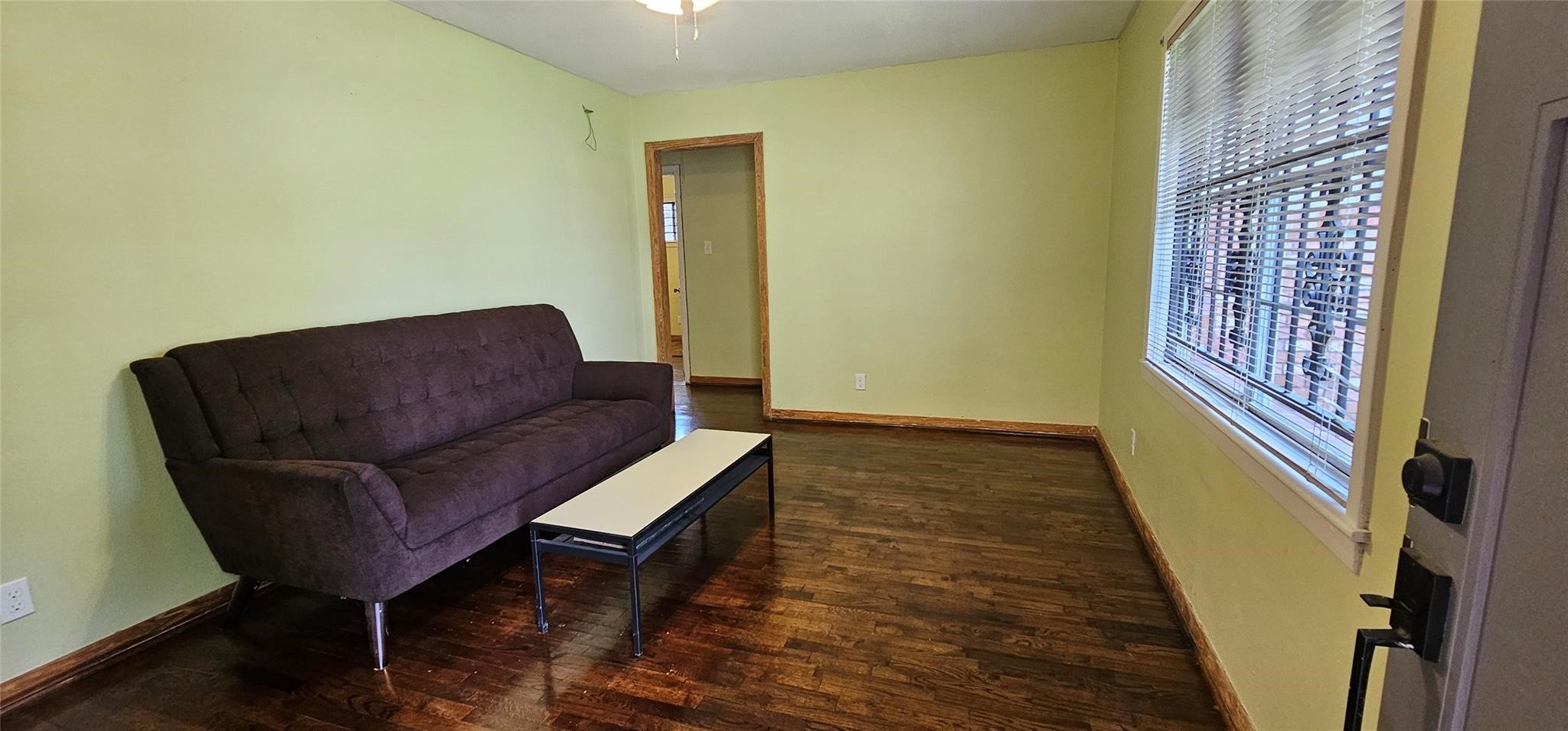 3610 Dennis Street Houston, TX 77004 - Photo 5 of 16 a living room with furniture and a rug