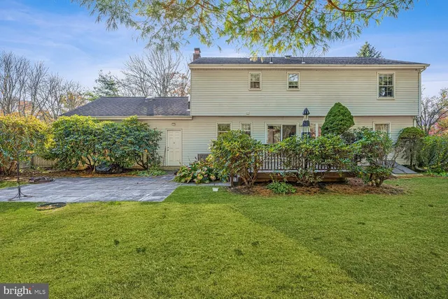 a view of a house with a garden