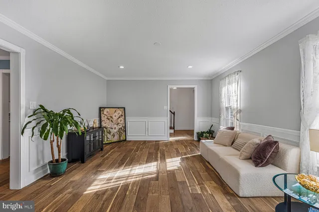 a spacious bedroom with a bed and a couch