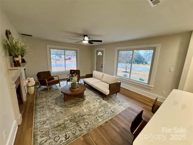 a living room with furniture and a window