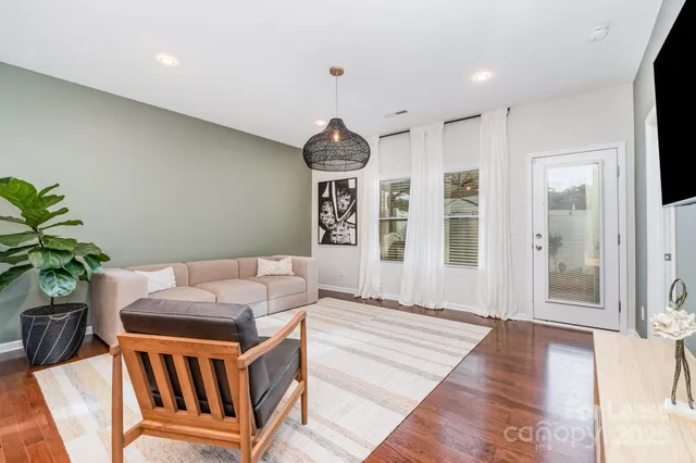 a bed room with furniture and a window