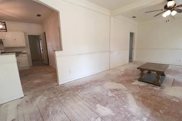 a view of a storage & utility room with a sink