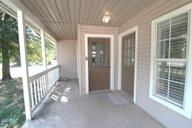 a view of hallway with windows