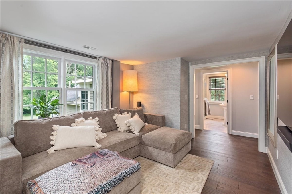 77 Main Street Boxford, MA 01921 - Photo 16 of 32 a living room with furniture and large windows