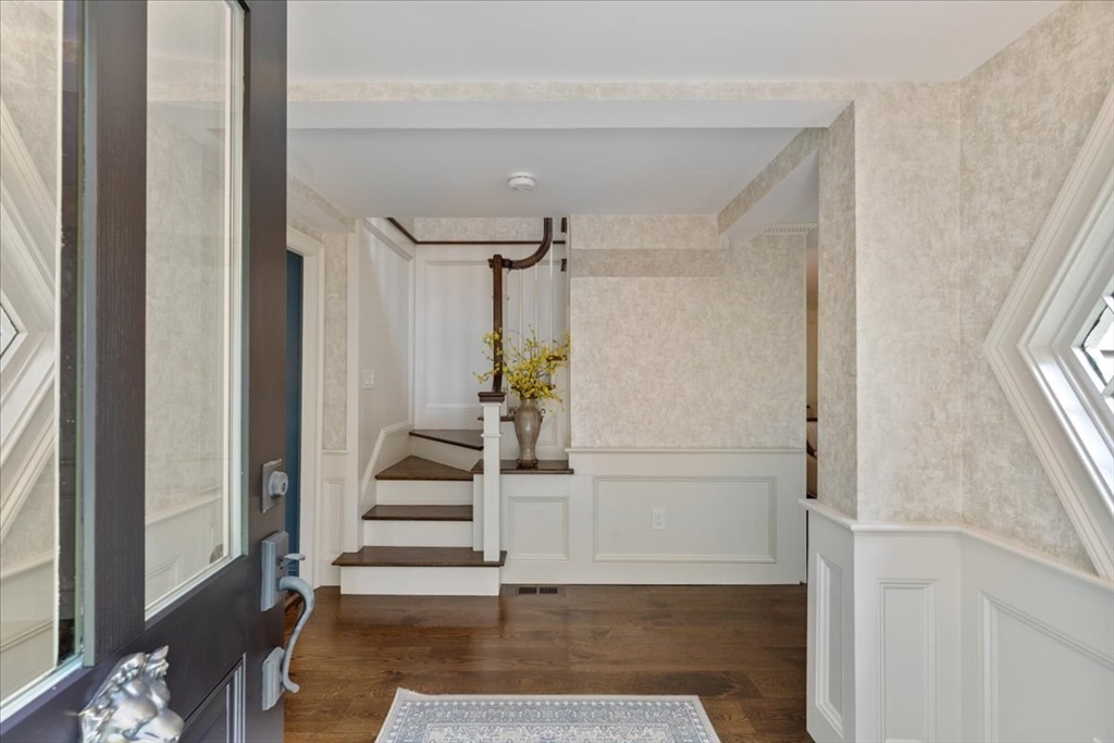 77 Main Street Boxford, MA 01921 - Photo 3 of 32 a view of entryway and hall with wooden floor