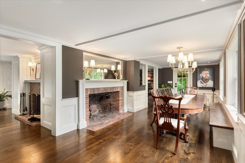 77 Main Street Boxford, MA 01921 - Photo 8 of 32 a view of a livingroom with furniture and a fireplace