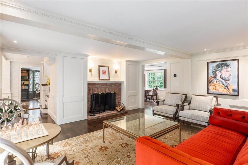 77 Main Street Boxford, MA 01921 - Photo 10 of 32 a living room with furniture and a fireplace