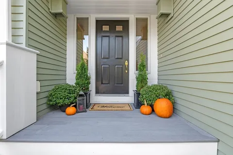 a view of outdoor space and front door