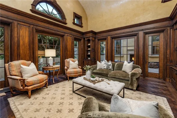 a living room with furniture or couch and a bookshelf