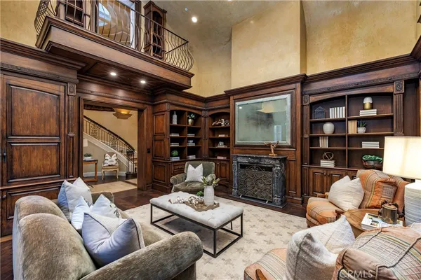 a room with furniture and pool table