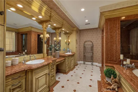 a bedroom with a bed and a potted plant