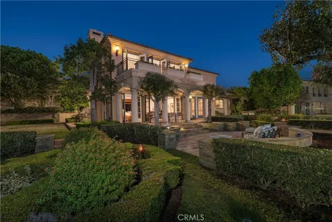 a view of a backyard with sitting area