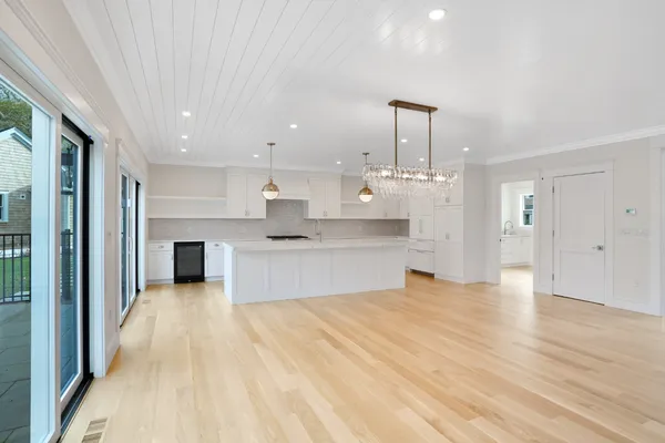 a kitchen with cabinets and window