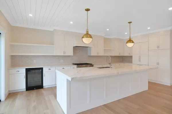 a room with a window closet and wooden floor